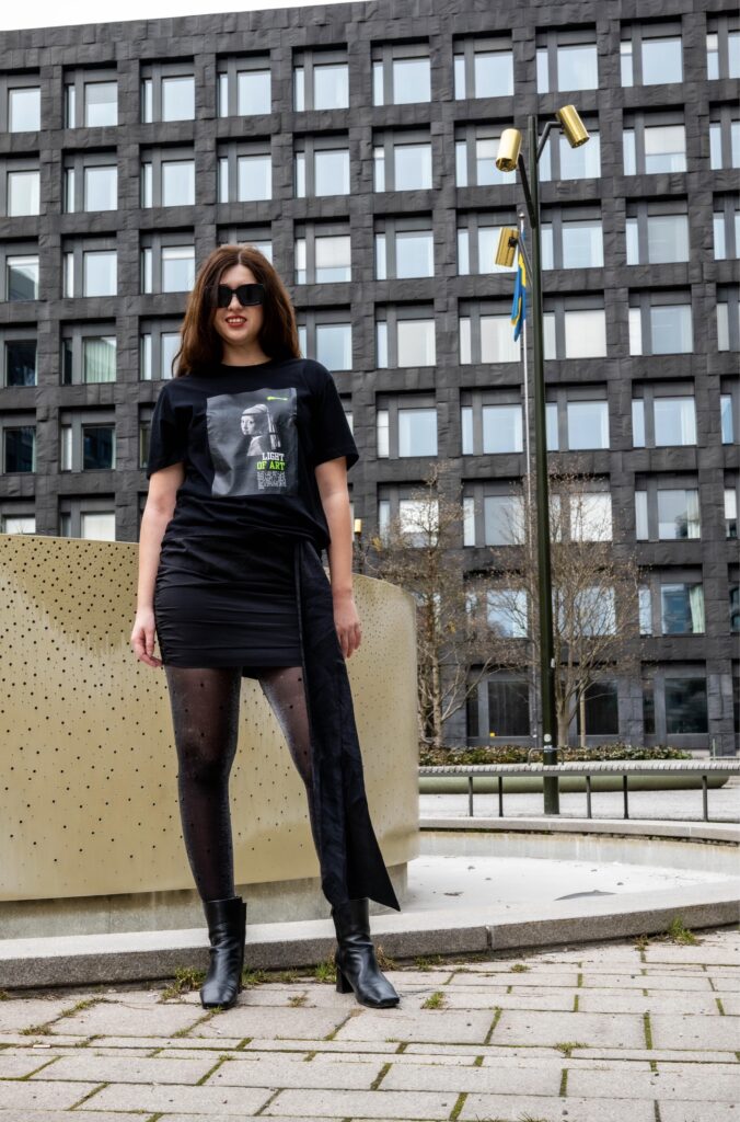 “Girl with a pearl” art print on black t-shirt.
